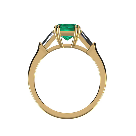 Emerald and diamond engagement ring, featuring a vibrant center emerald in double prong setting, flanked by tapered baguette diamonds, available in 14K White, Yellow, Rose Gold, 18K Yellow Gold, 19K White Gold, and Platinum.