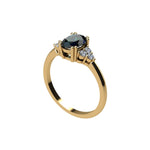 Sapphire and diamond engagement ring with oval teal sapphire, set in 14k yellow, rose, or white gold, and 18k yellow or 19k white gold, featuring a slim band with round brilliant cut diamonds